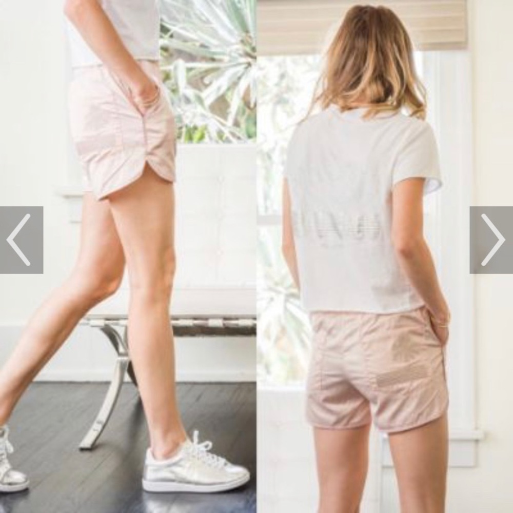 Anine Bing pink satin shorts.